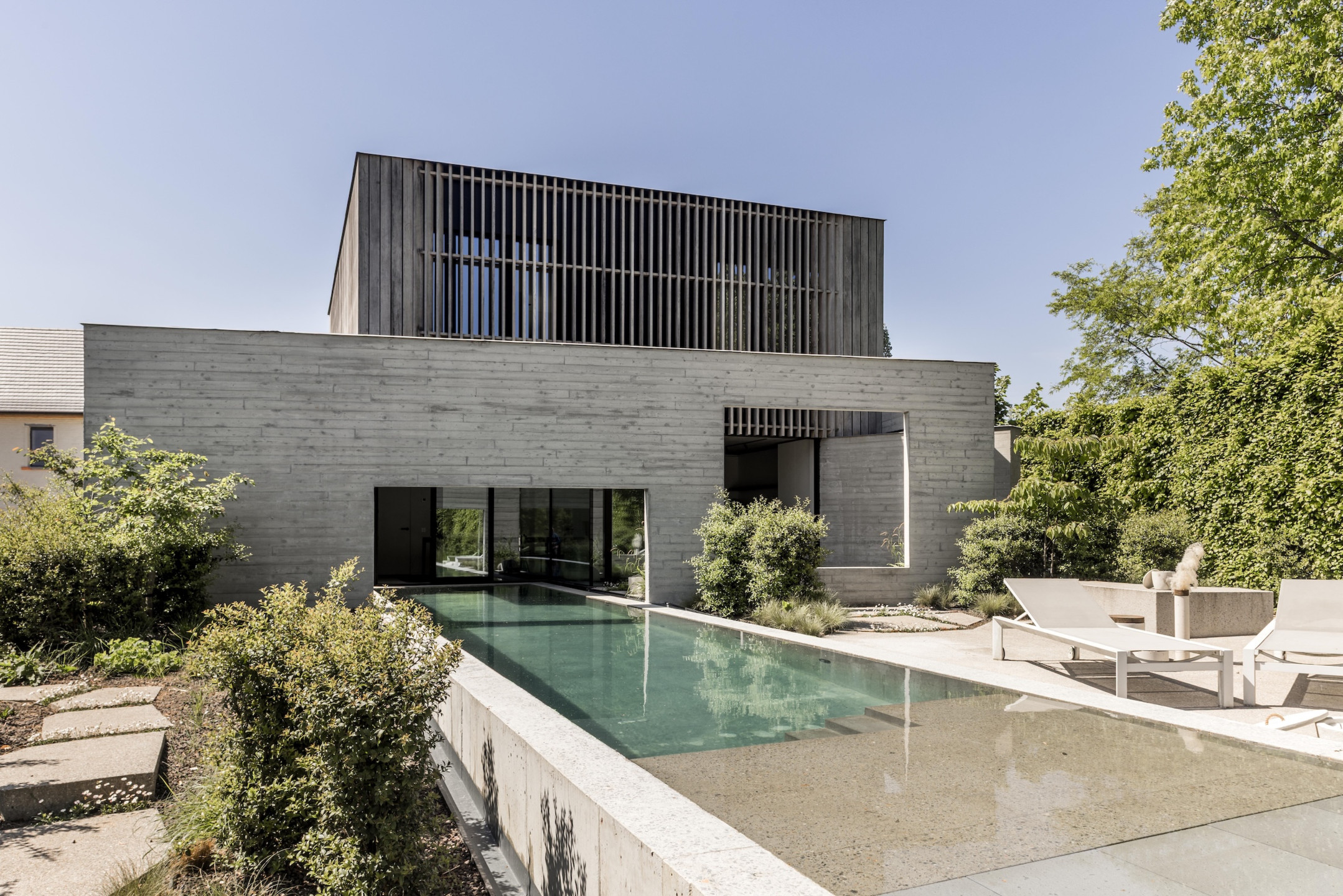 Merchtem - Brutalistische woning met Terrazzo betonvloer